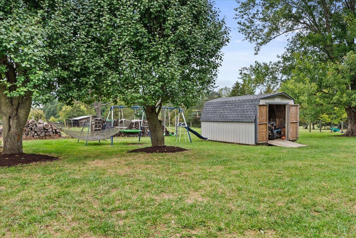 454 Dooms Crossing Road Waynesboro, VA 22980 - Photo 27 of 35 a view of a house with a backyard