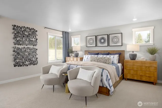a kitchen with kitchen island white cabinets and stainless steel appliances