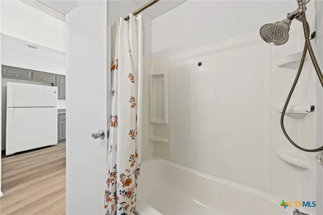 an empty room with closet area