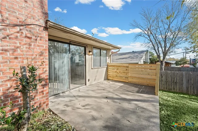 a picture of a bathroom with a shower and a mirror