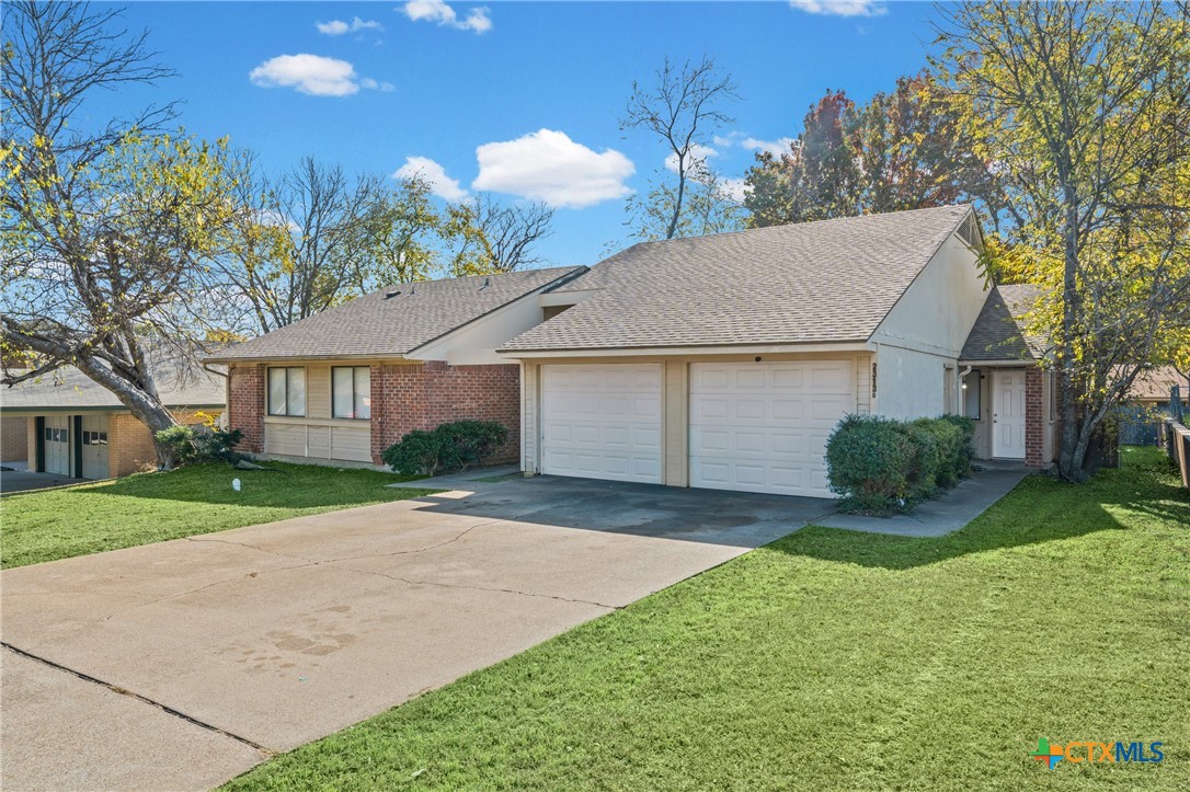 2313 Paul Revere Street, Unit A Temple, TX 76504 - Photo 2 of 22 a view of outdoor space yard and garage
