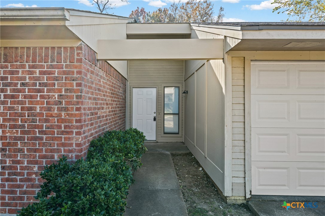2313 Paul Revere Street, Unit A Temple, TX 76504 - Photo 3 of 22 a view of a pathway along the house