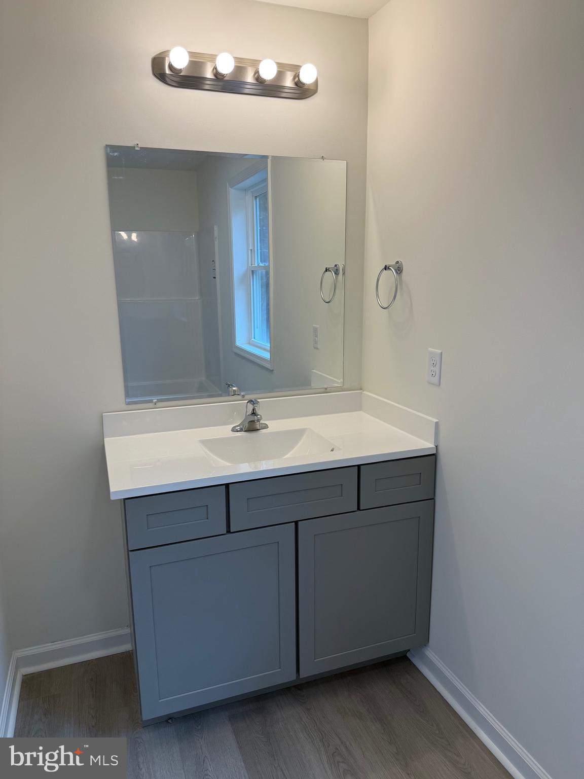 26994 Branchtown Road Worton, MD 21678 - Photo 16 of 24 a bathroom with a sink and a mirror