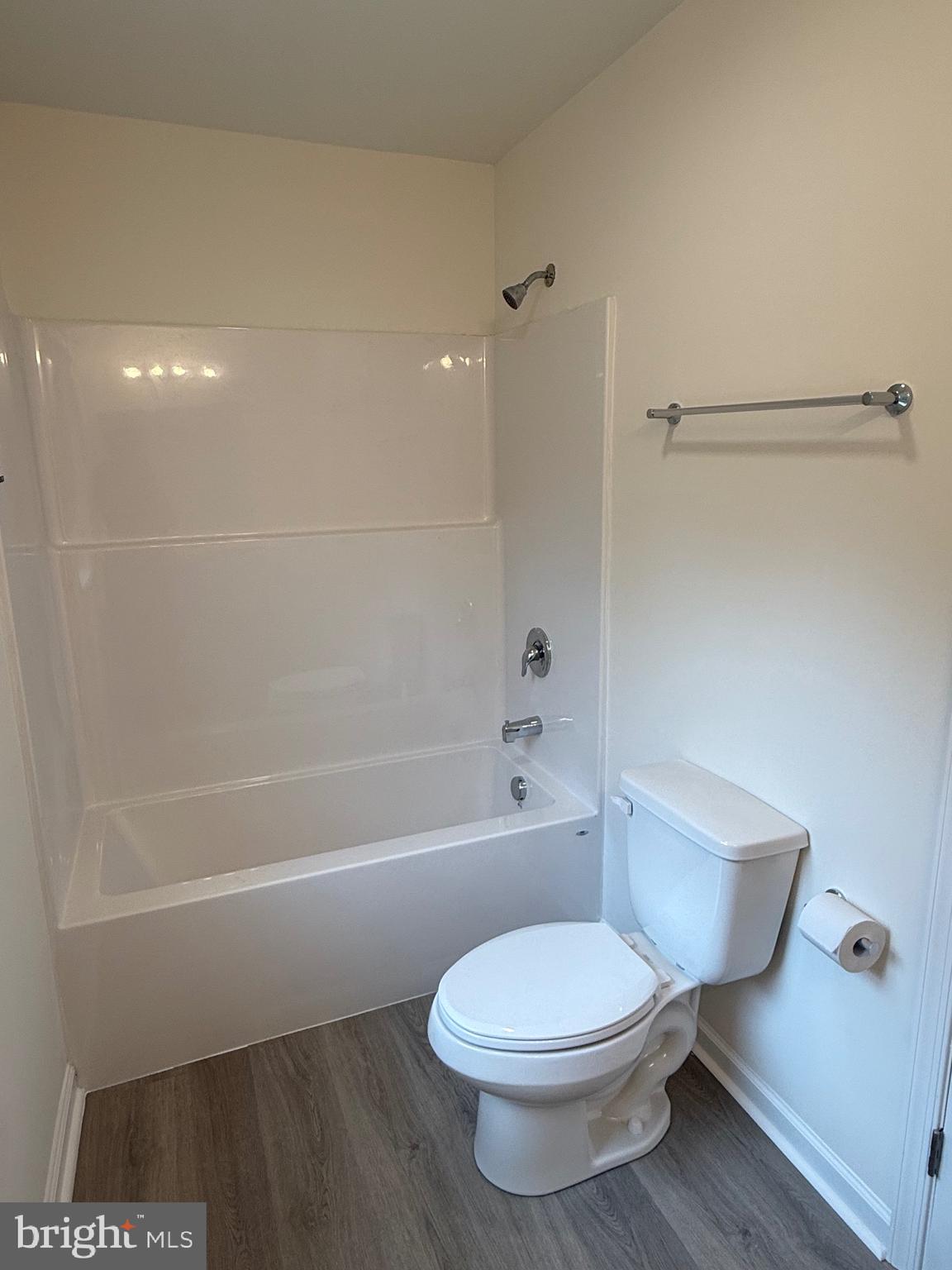 26994 Branchtown Road Worton, MD 21678 - Photo 17 of 24 a bathroom with a toilet and a bath tub