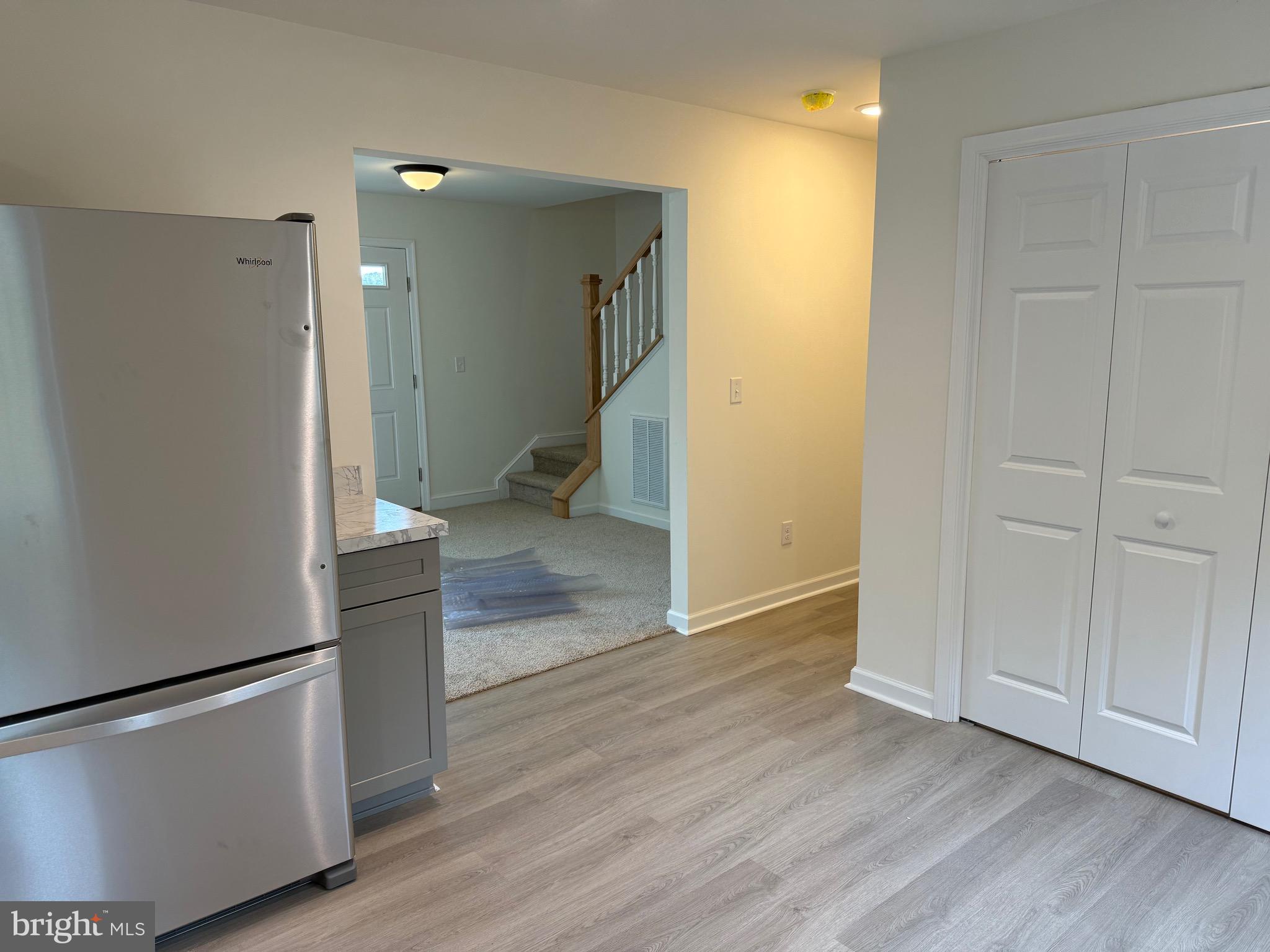 26994 Branchtown Road Worton, MD 21678 - Photo 4 of 24 a view of a hallway with wooden floor and closet