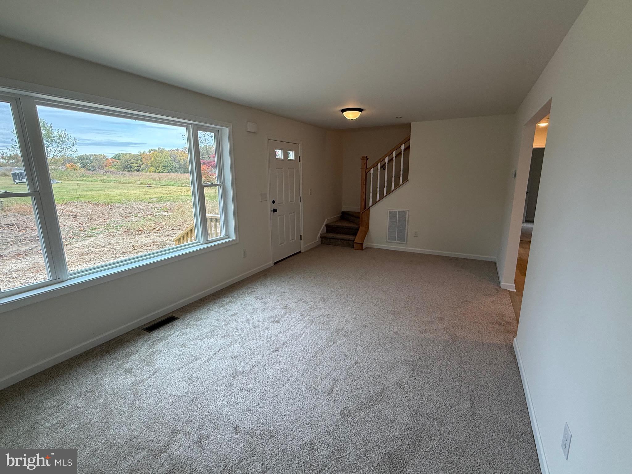 26994 Branchtown Road Worton, MD 21678 - Photo 9 of 24 a view of an empty room with a window