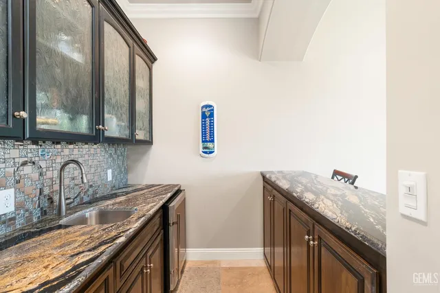 a room with furniture pool table and flat screen tv