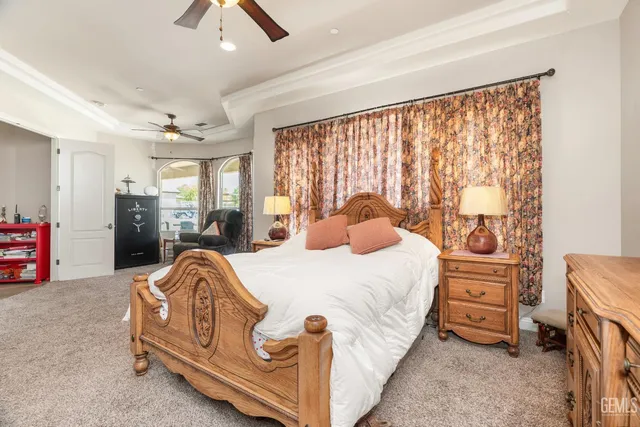 a bathroom with a granite countertop sink a mirror and a vanity