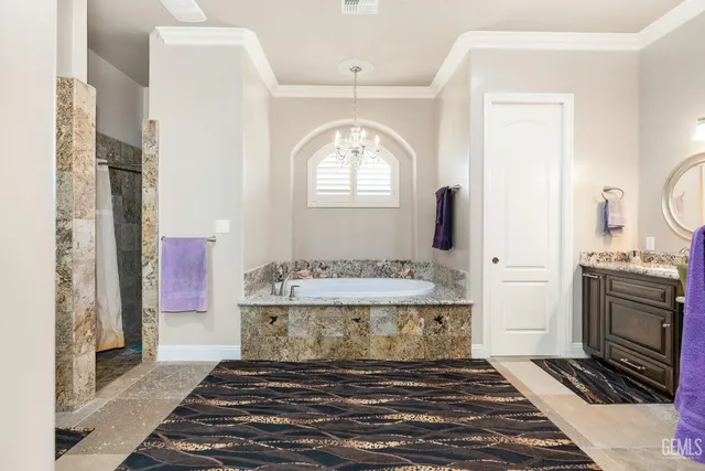 a utility room with sink dryer and washer