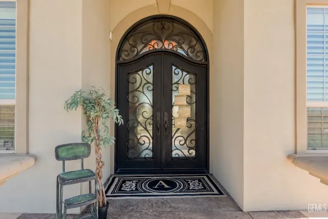 a view of hall way with furniture