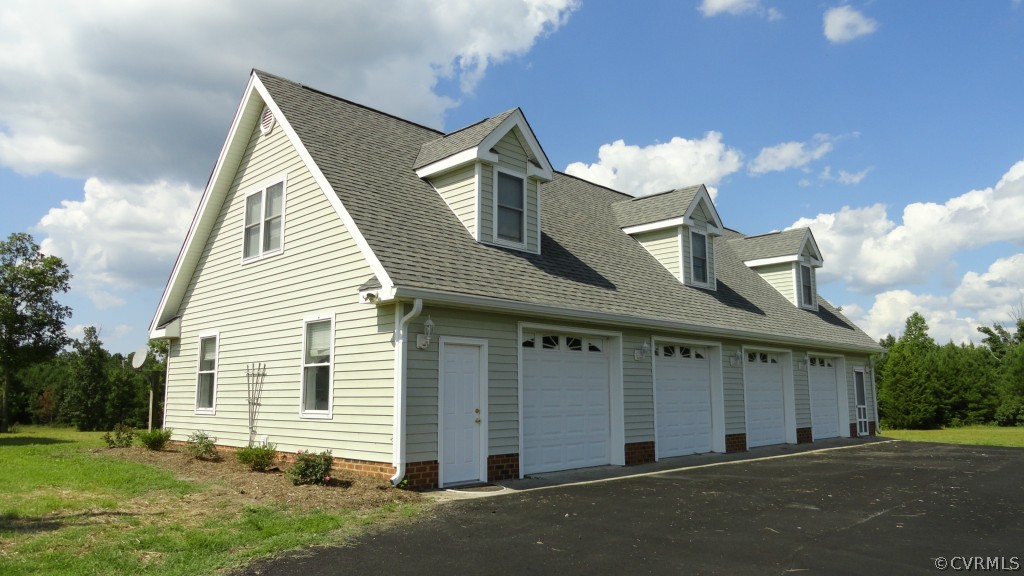 4647 The Falls Road Crewe, VA 23930 - Photo 4 of 23 a front view of a house with a yard