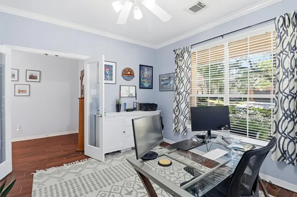 a workspace with furniture and window