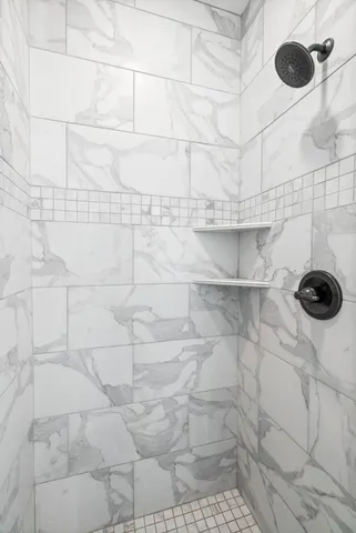 a view of a room with racks on the wall