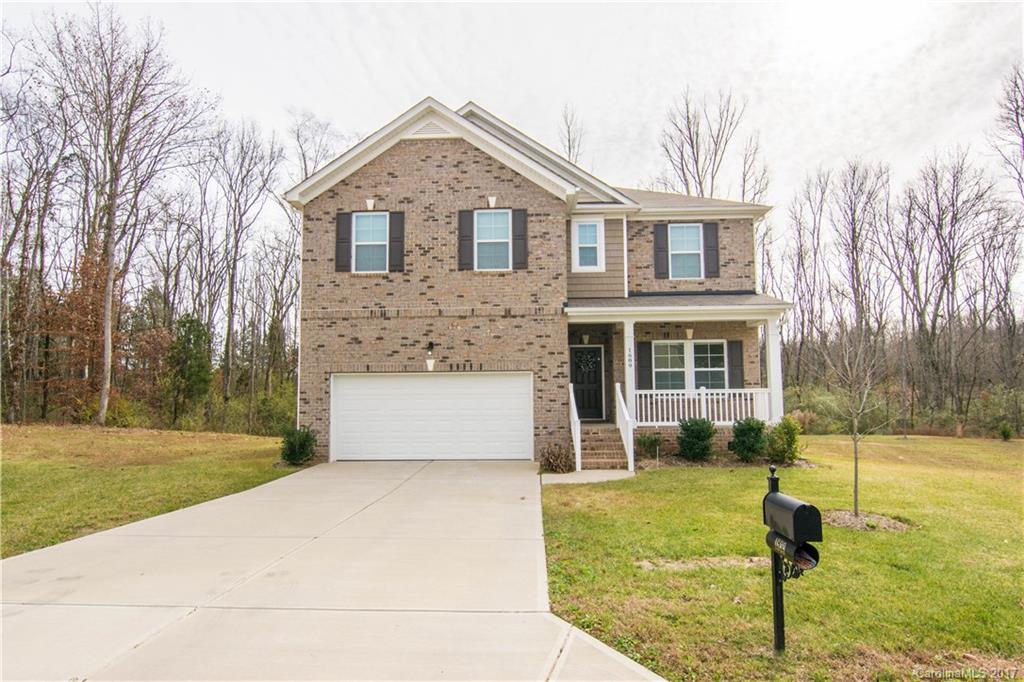 1689 Beleek Ridge Lane Clover, SC 29710 - Photo 1 of 24 a front view of a house with garden