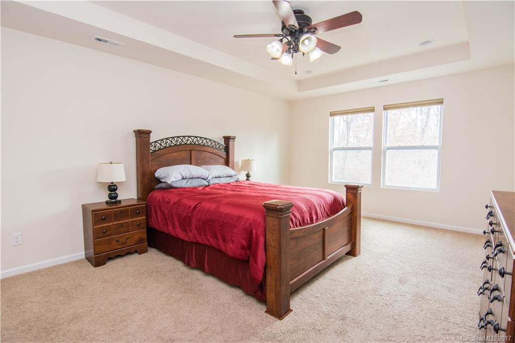 1689 Beleek Ridge Lane Clover, SC 29710 - Photo 15 of 24 a bedroom with a bed and window