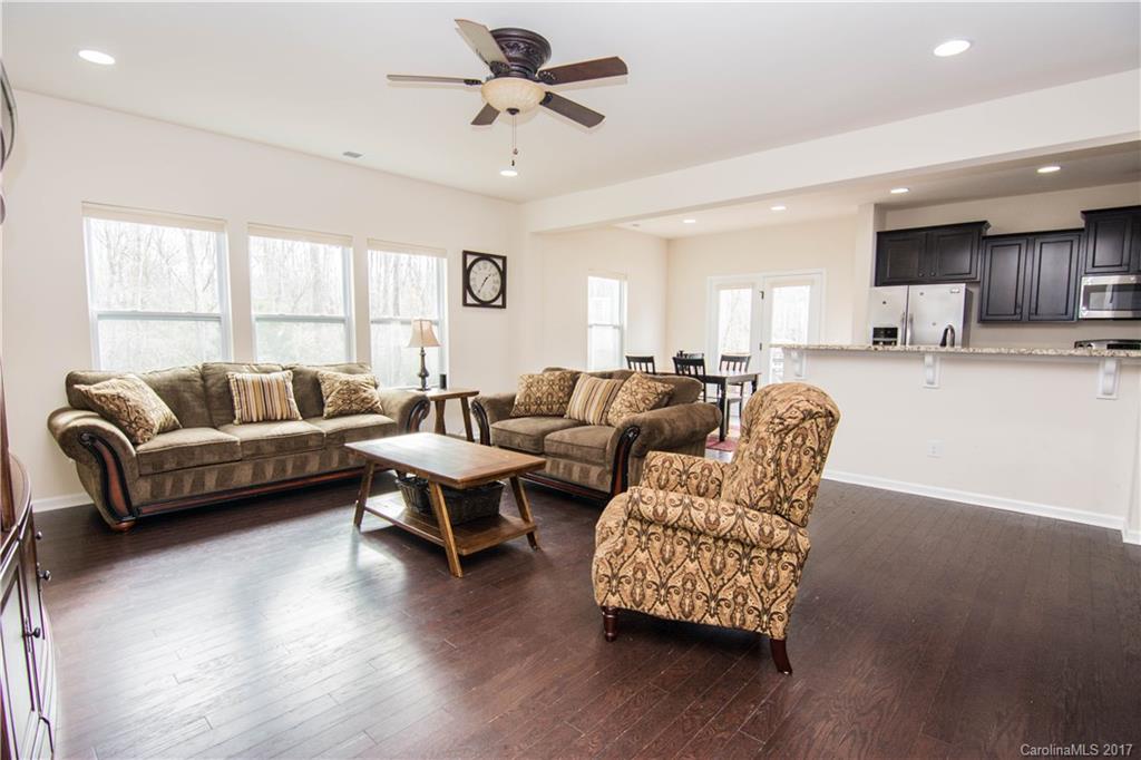 1689 Beleek Ridge Lane Clover, SC 29710 - Photo 7 of 24 a living room with furniture and wooden floor