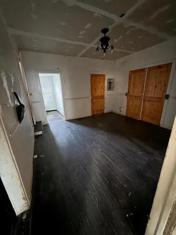 a bathroom with a bathtub and a toilet