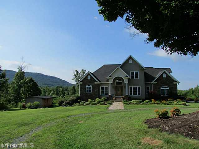 Exterior Front. Absolutely Stunning! Custom Built home on 10.77 ACRES! Panaramic views of surrounding Mountains!