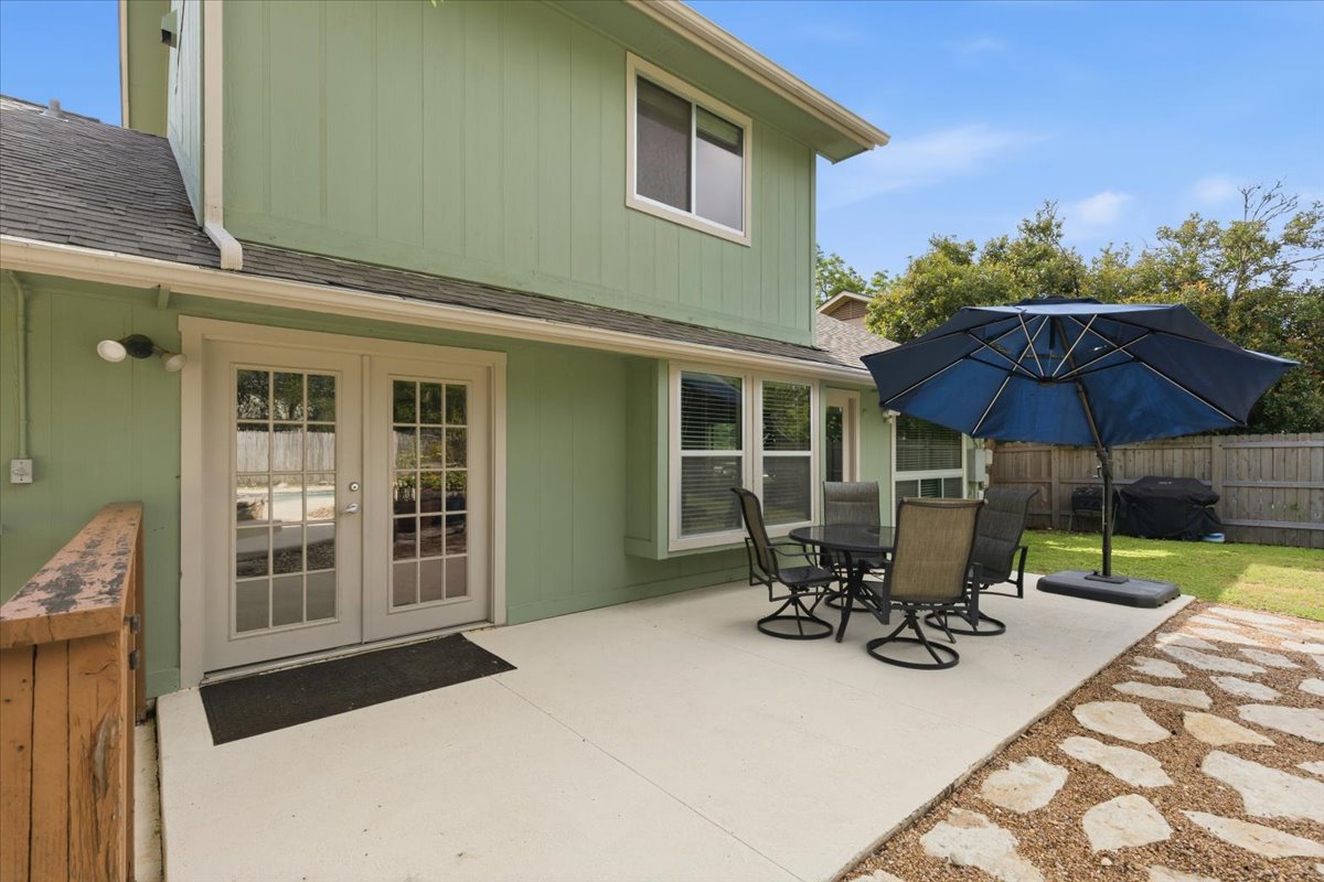 12400 Rusted Nail Cove Austin, TX 78750 - Photo 27 of 31 A large patio offers plenty of room for outdoor dining and lounging.