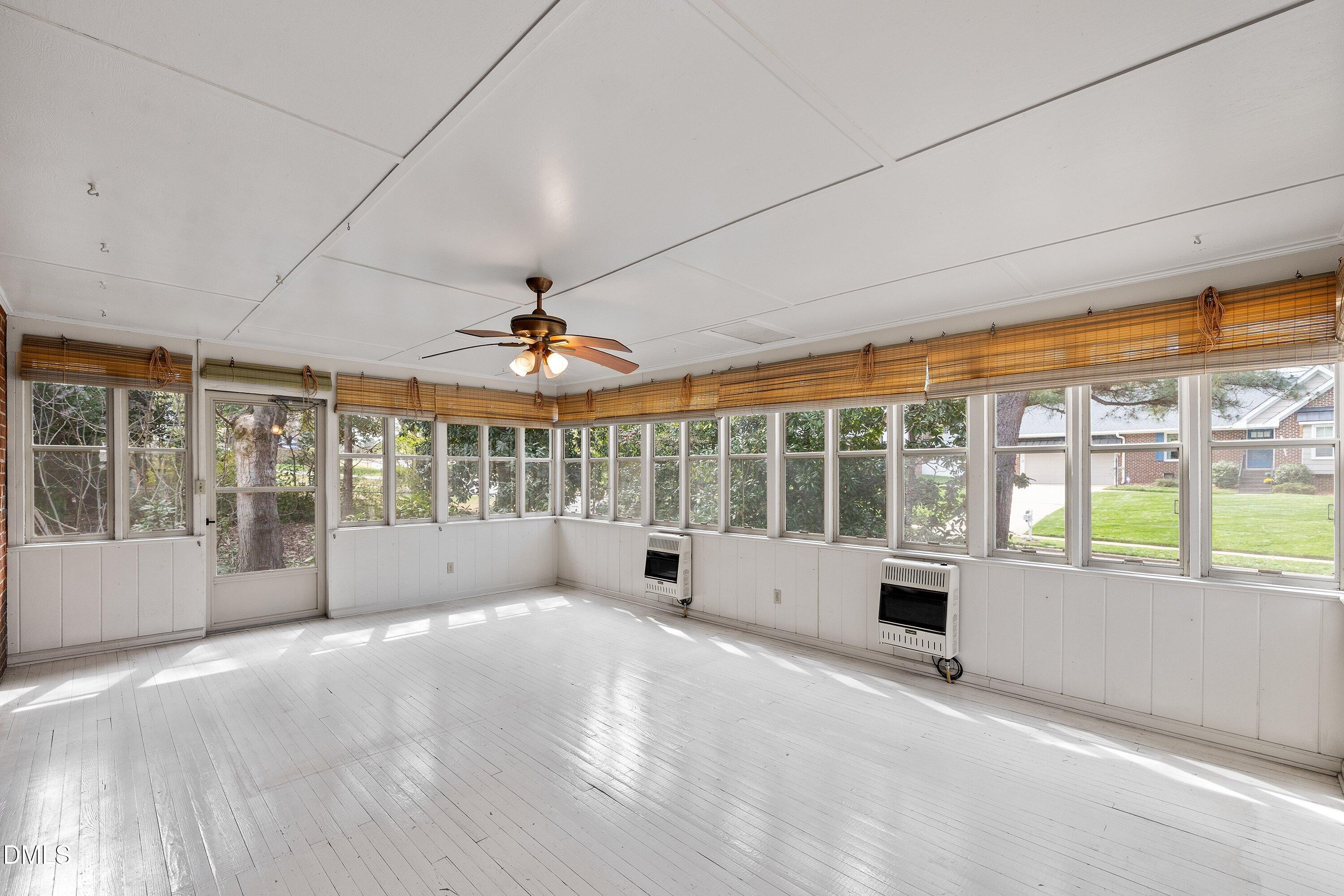 400 Cedar Hill Lane Raleigh, NC 27609 - Photo 12 of 41 a view of an empty room with a window