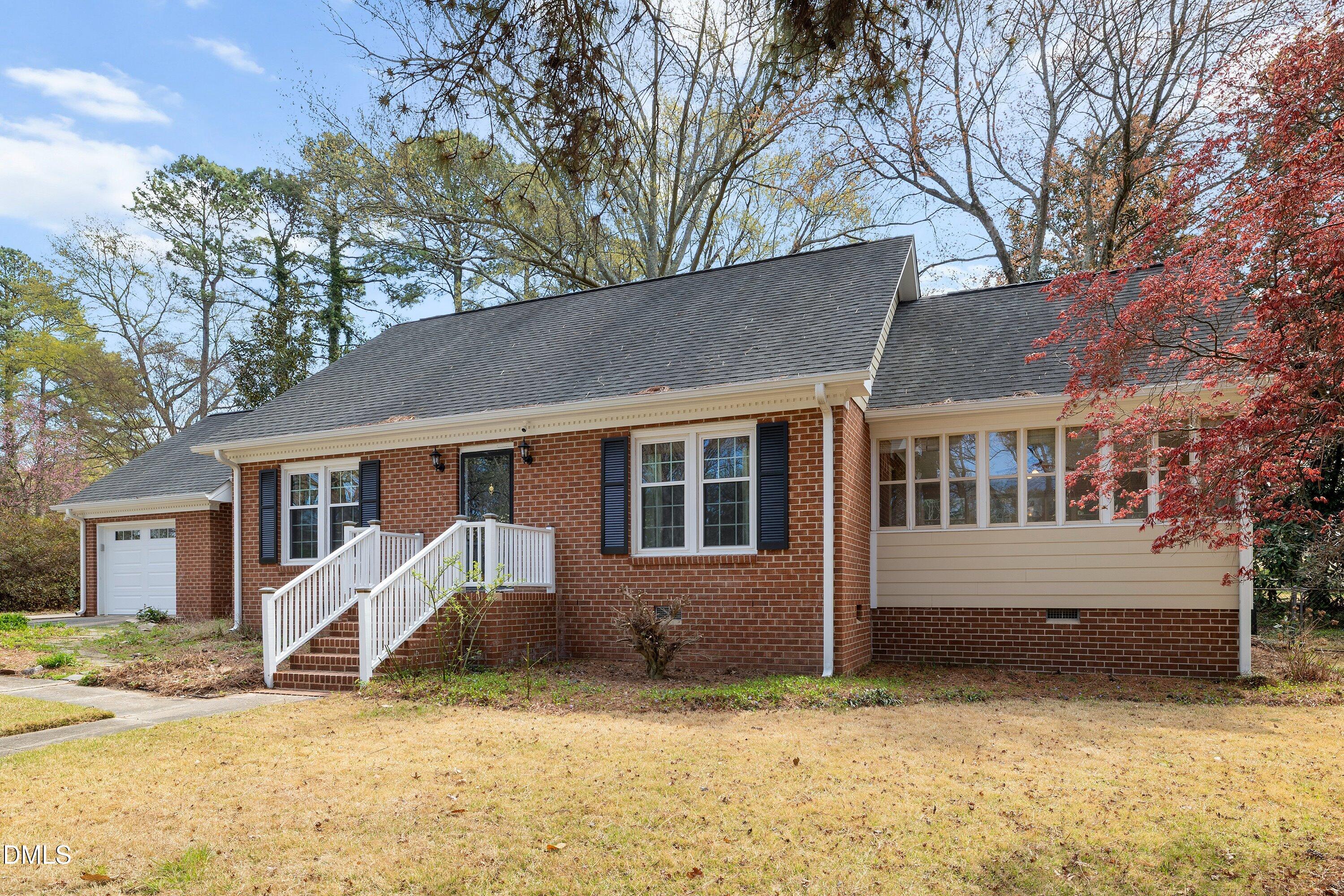 400 Cedar Hill Lane Raleigh, NC 27609 - Photo 2 of 41 a view of a house with a yard