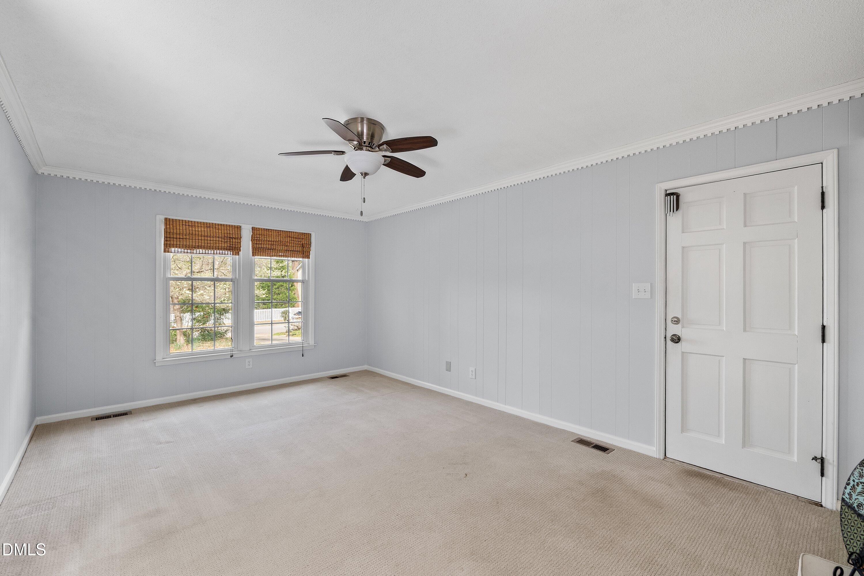 400 Cedar Hill Lane Raleigh, NC 27609 - Photo 29 of 41 a view of an empty room with a window