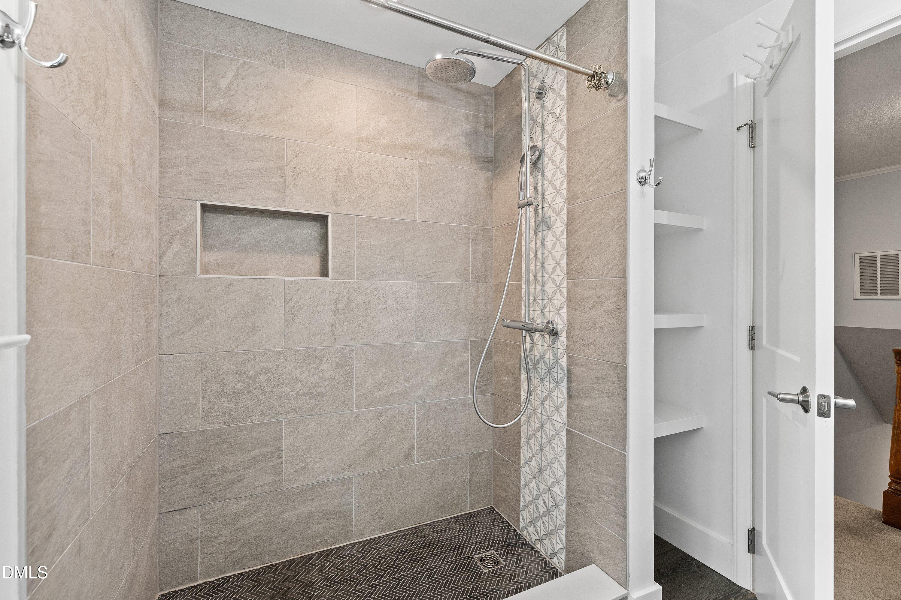400 Cedar Hill Lane Raleigh, NC 27609 - Photo 33 of 41 a bathroom with a shower