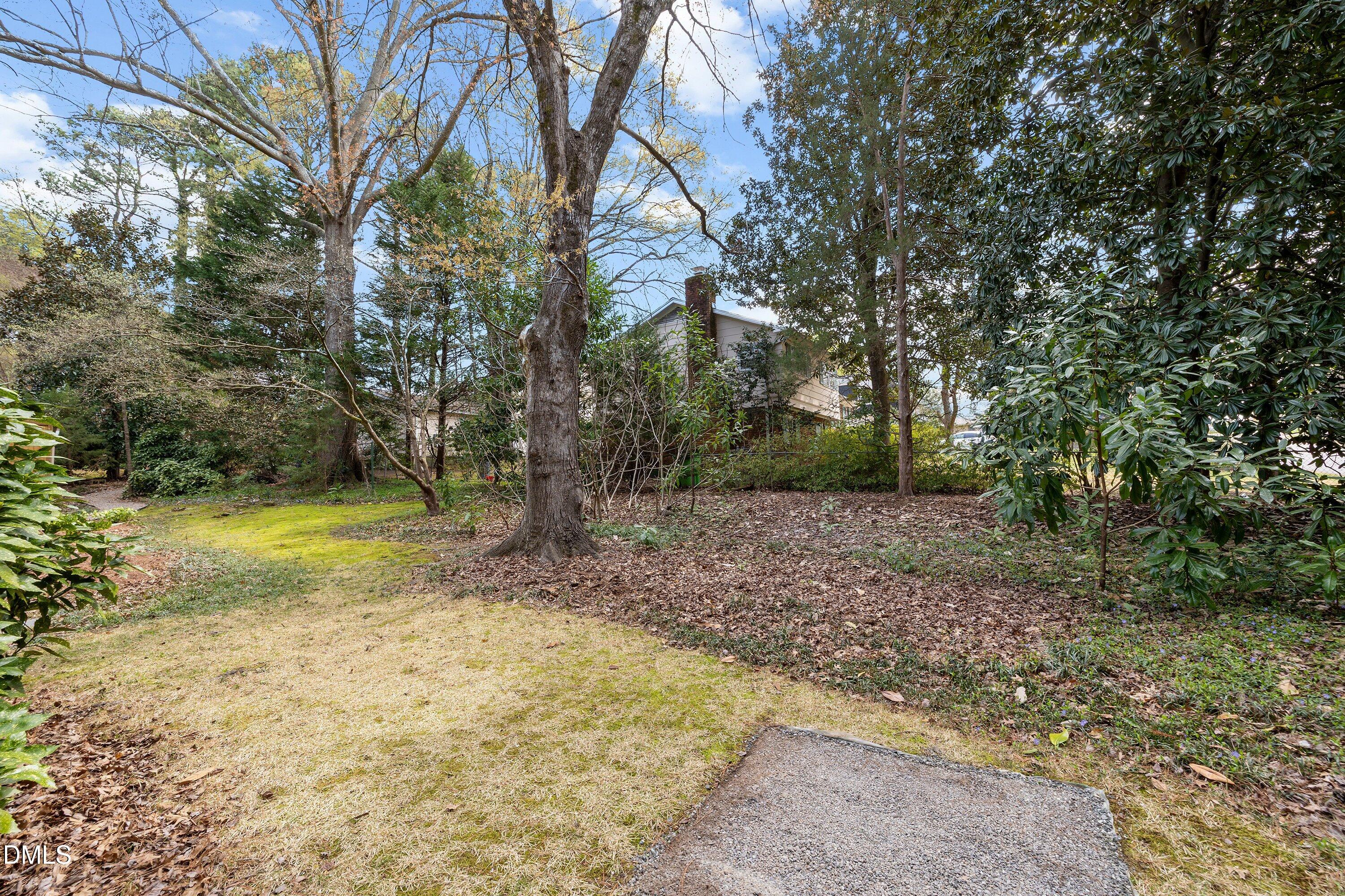 400 Cedar Hill Lane Raleigh, NC 27609 - Photo 39 of 41 a view of a yard with trees