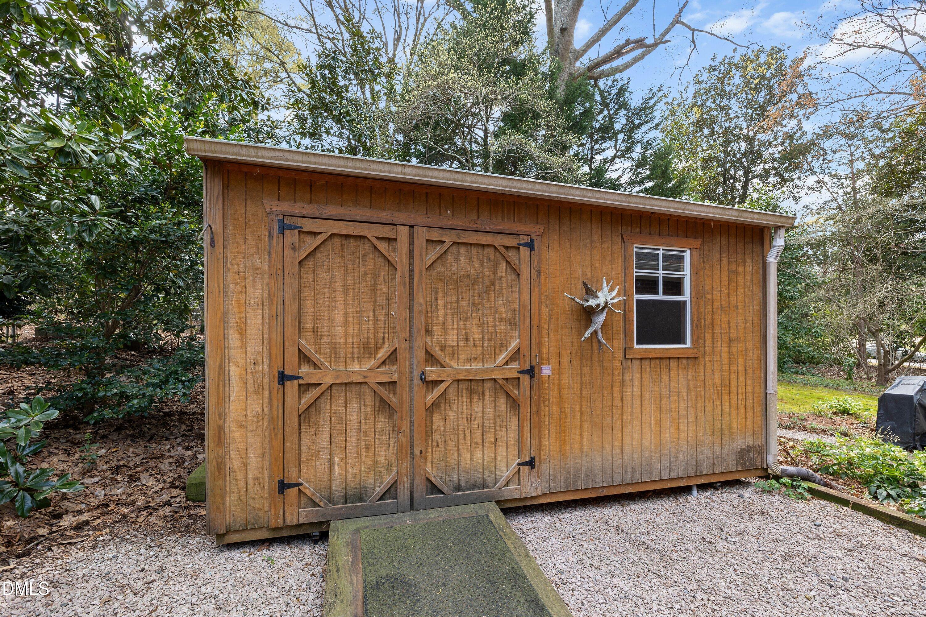 400 Cedar Hill Lane Raleigh, NC 27609 - Photo 41 of 41 a view of a house with a wooden door