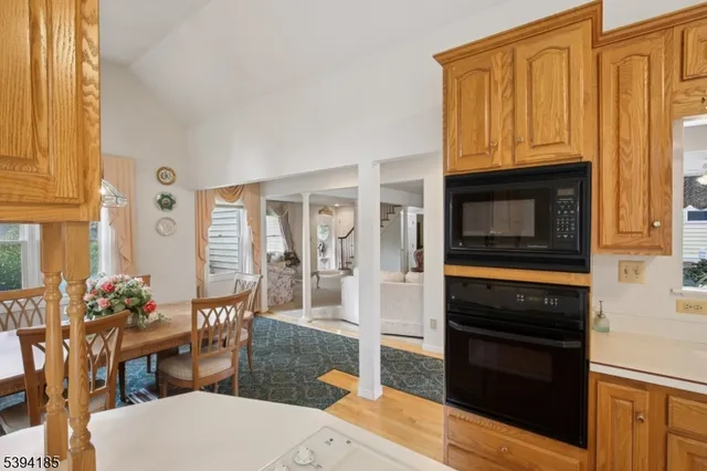 a kitchen with stainless steel appliances granite countertop a stove top oven
