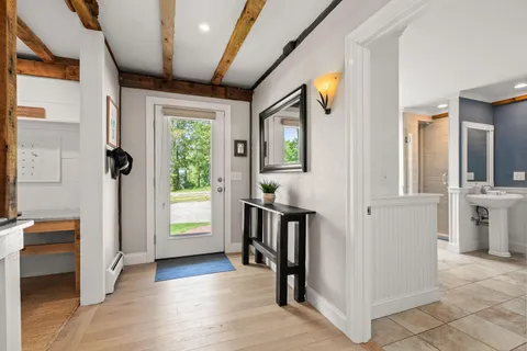 a room with window and cabinet