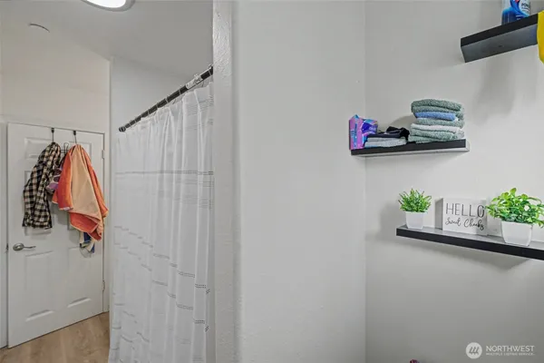 a view of a closet with storage