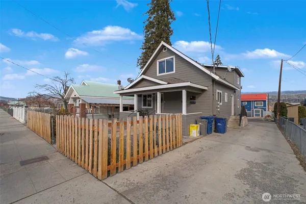 a front view of a house with a porch