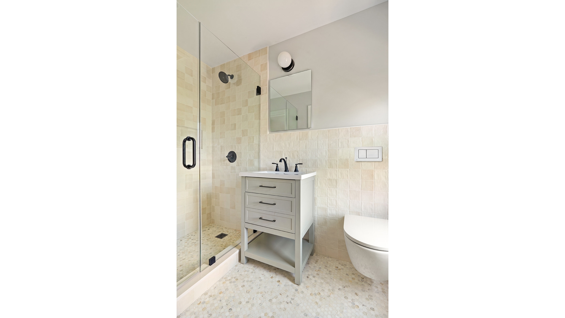 159 Bond Street Brooklyn, NY 11217 - Photo 20 of 32 a bathroom with a sink a toilet and shower