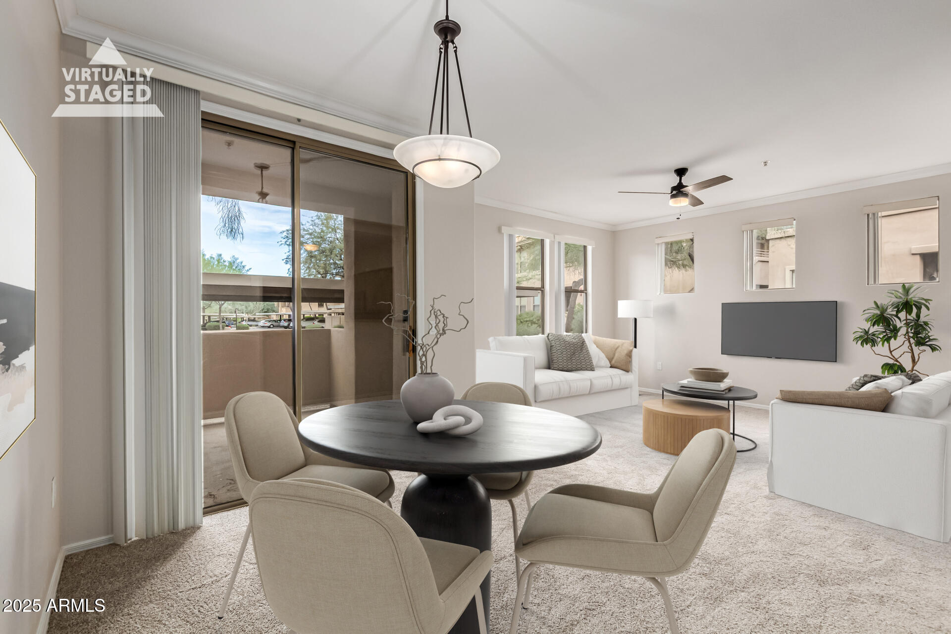 20100 North 78th Place, Unit 1064 Scottsdale, AZ 85255 - Photo 11 of 37 a view of a dining room with furniture and a chandelier