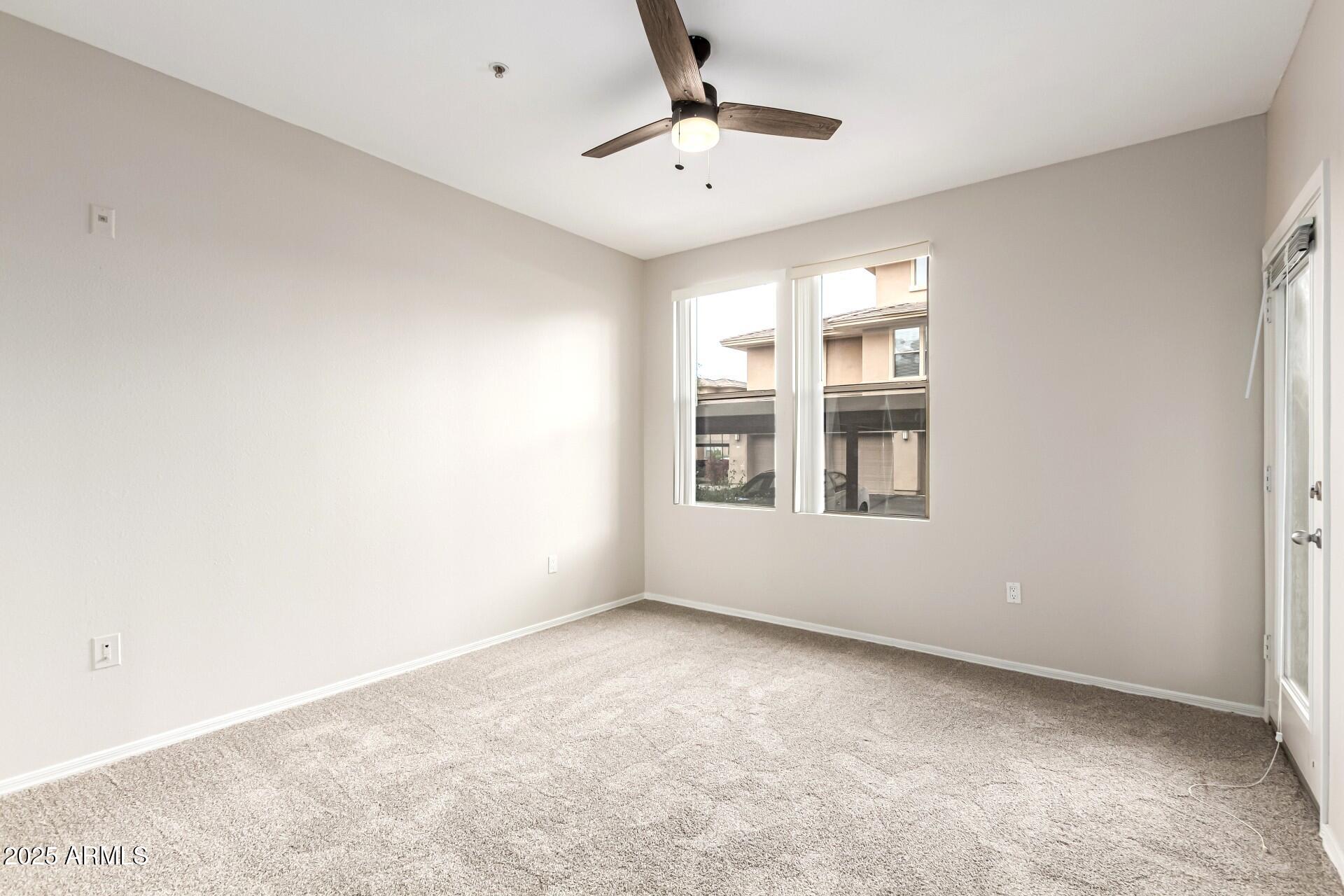 20100 North 78th Place, Unit 1064 Scottsdale, AZ 85255 - Photo 17 of 37 a view of an empty room with a window