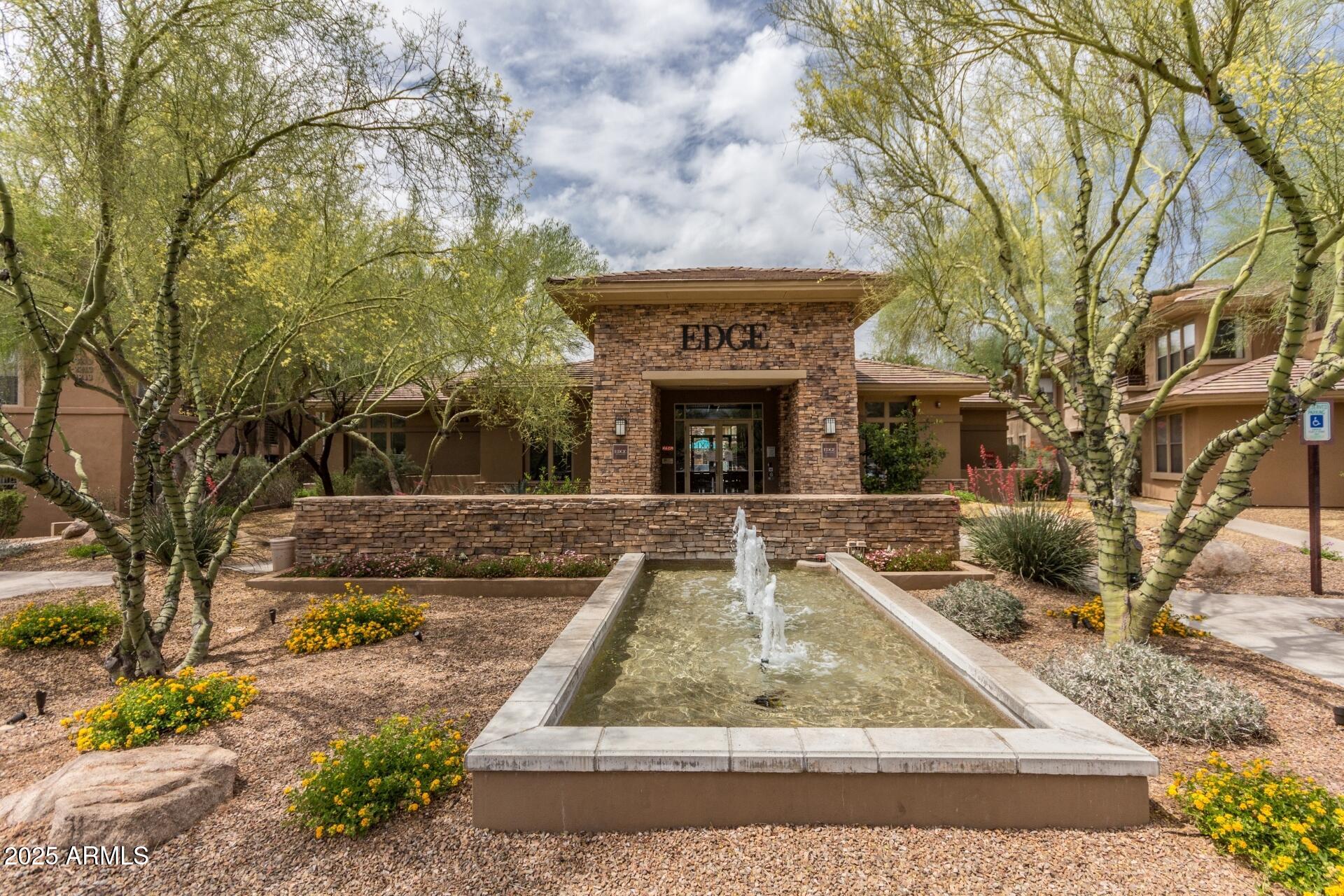 20100 North 78th Place, Unit 1064 Scottsdale, AZ 85255 - Photo 24 of 37 a view of a yard with plants