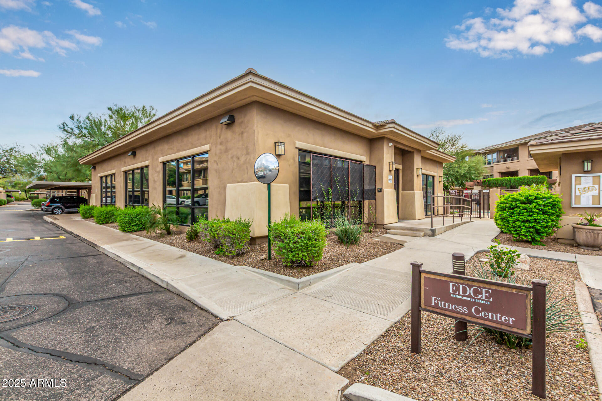 20100 North 78th Place, Unit 1064 Scottsdale, AZ 85255 - Photo 26 of 37 a front view of a house with porch