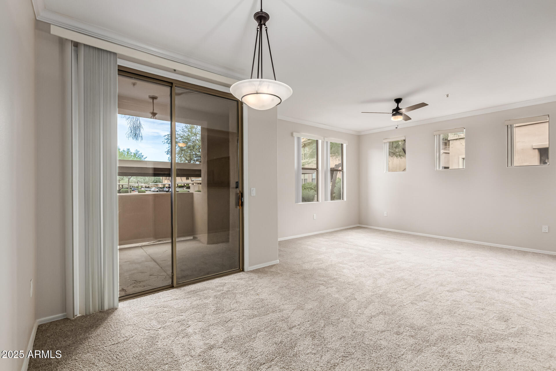 20100 North 78th Place, Unit 1064 Scottsdale, AZ 85255 - Photo 9 of 37 a view of an empty room with a window