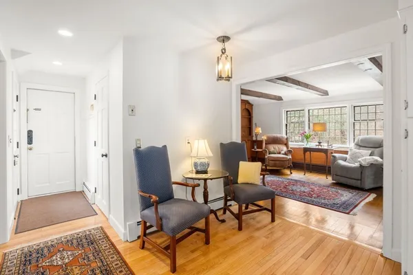 a living room with furniture and a rug