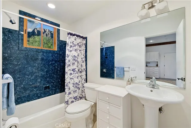 a view of parking garage with cars