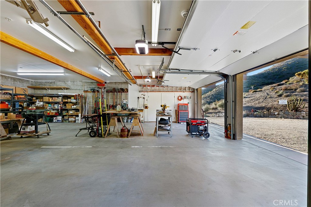 8400 Mipolomol Road Malibu, CA 90265 - Photo 48 of 59 a view of parking garage with cars