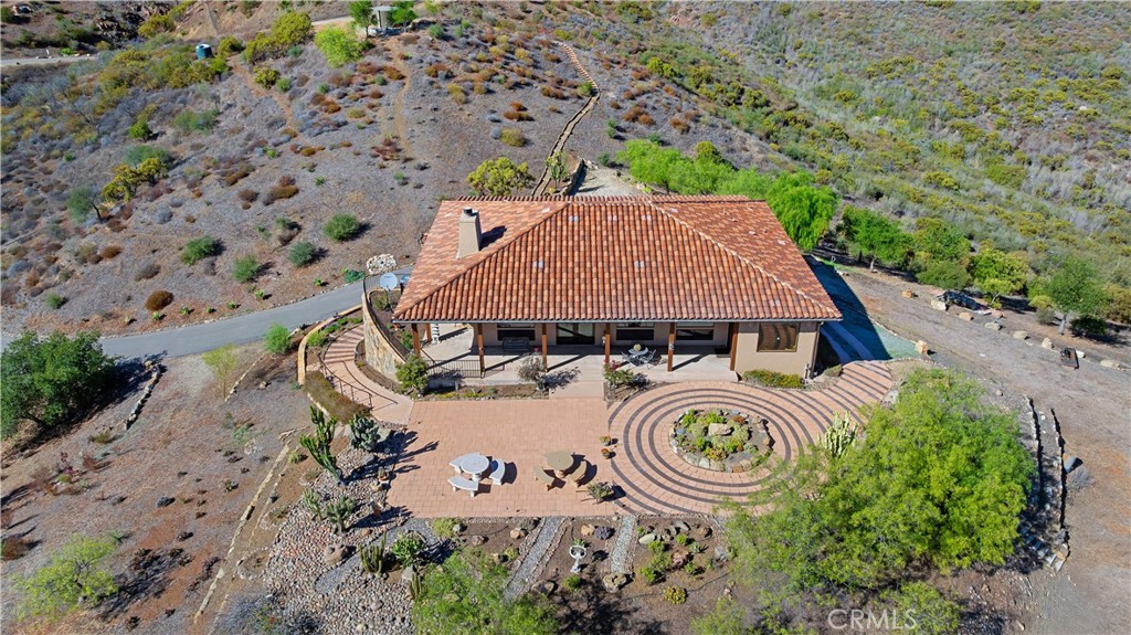 8400 Mipolomol Road Malibu, CA 90265 - Photo 54 of 59 an aerial view of a house with swimming pool and big yard