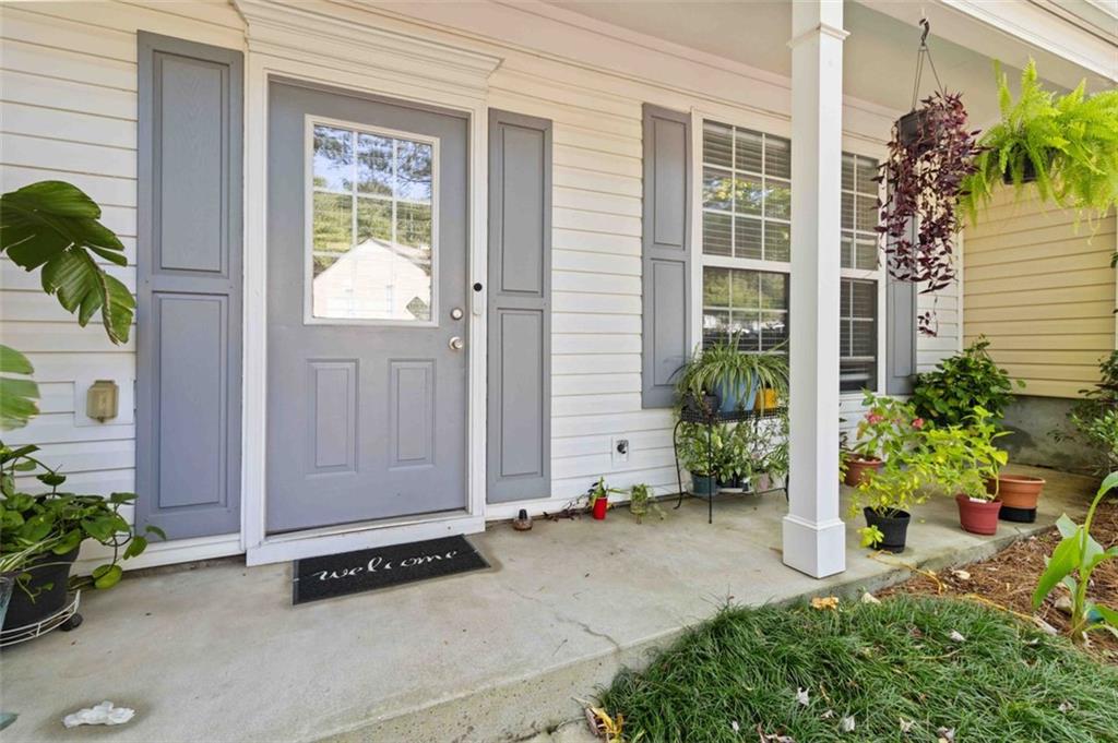 3752 Berkeley Crossing Duluth, GA 30096 - Photo 3 of 23 a view of backyard with potted plants and a potted plant
