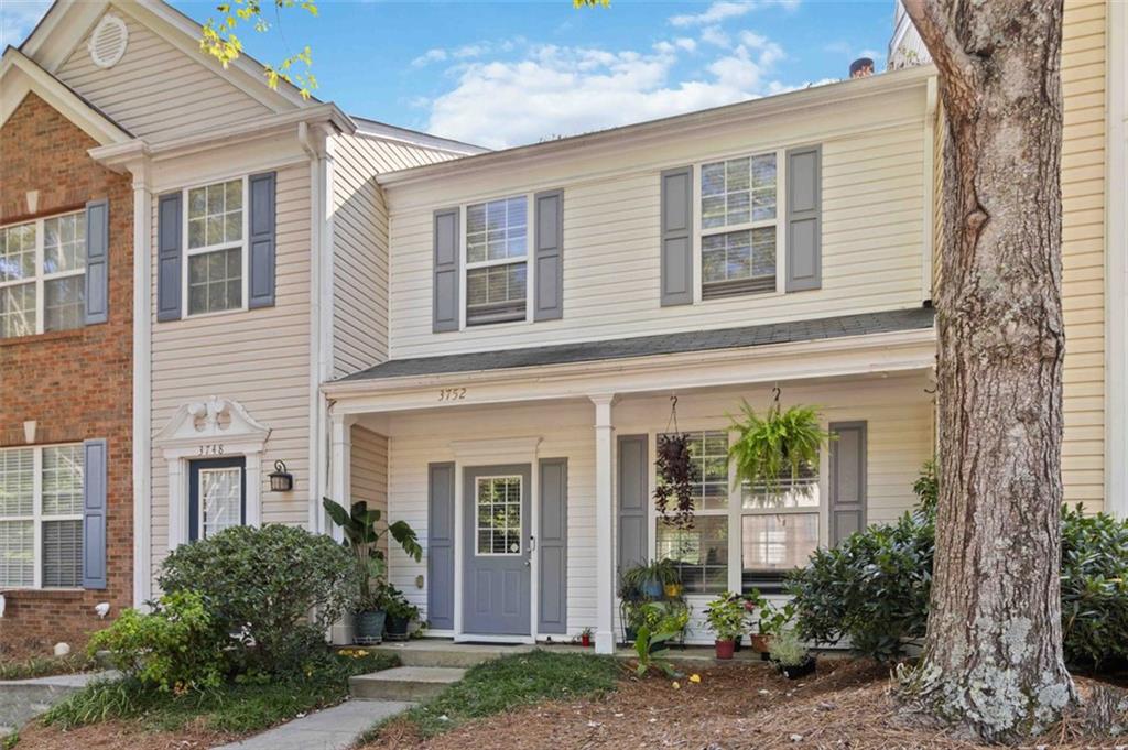 3752 Berkeley Crossing Duluth, GA 30096 - Photo 4 of 23 front view of house with a yard