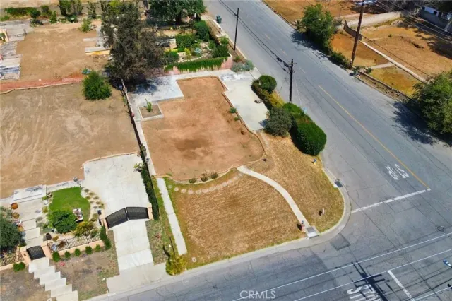 a view of a swimming pool with outdoor seating