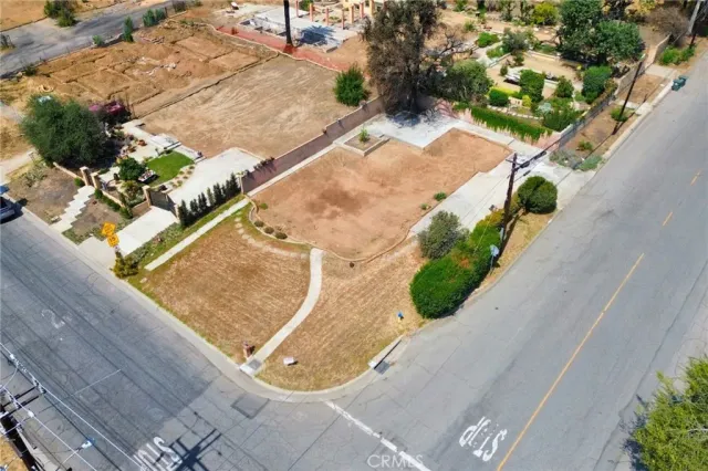 a view of a swimming pool with outdoor seating