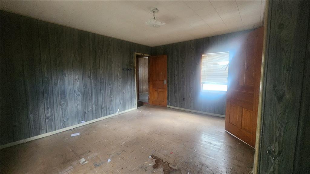 140 High Street Avonmore, PA 15618 - Photo 12 of 19 a view of empty room with wooden floor and fan