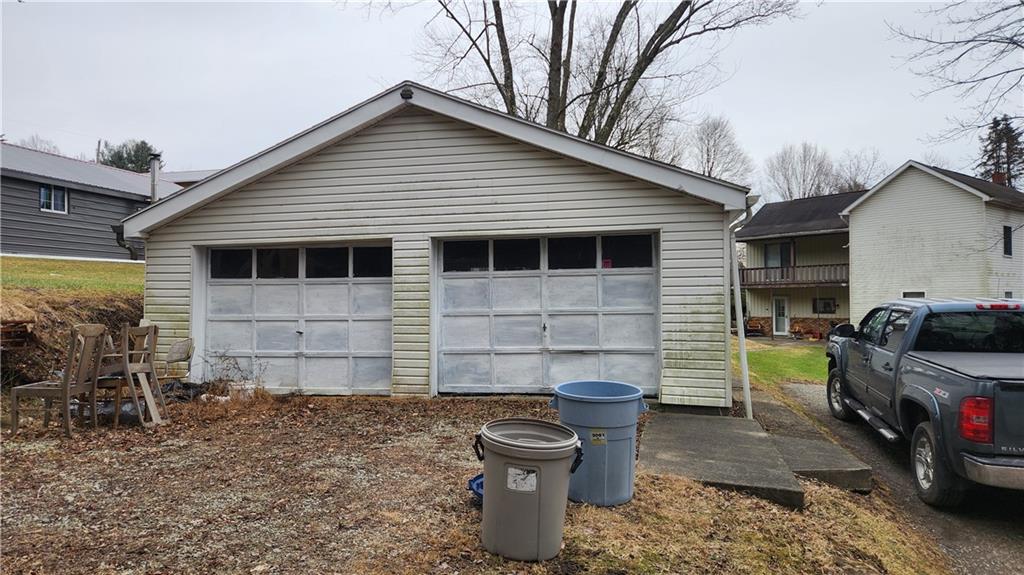 140 High Street Avonmore, PA 15618 - Photo 17 of 19 a view of a house with a patio
