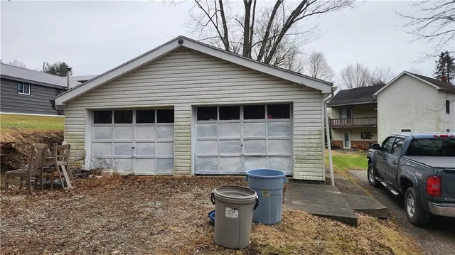 a house view with a backyard space